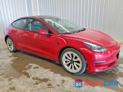 Czwarte zdjęcie samochodu z boku: 2023 TESLA MODEL 3 VIN:5YJ3E1EA7PF433929 - miniatura