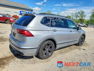 Trzecie zdjęcie samochodu z tyłu: 2023 VOLKSWAGEN TIGUAN SE R-LINE BLACK VIN:3VVCB7AXXPM016565 - miniatura