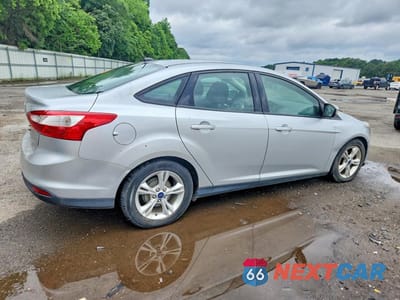 Trzecie zdjęcie samochodu z tyłu: 2014 FORD FOCUS SE VIN:1FADP3F21EL181404 - miniatura