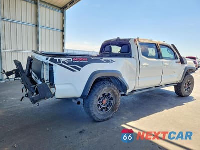 Trzecie zdjęcie samochodu z tyłu: 2019 TOYOTA TACOMA TRD OFF-ROAD VIN:3TMDZ5BN0KM073043 - miniatura