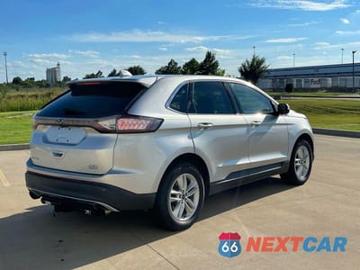 Czwarte zdjęcie samochodu z boku: 2015 FORD EDGE SEL VIN:2FMTK3J96FBB33788 - miniatura
