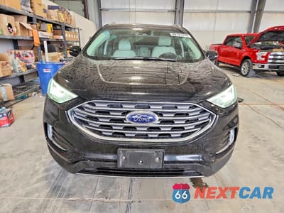 Piąte zdjęcie samochodu w środku: 2019 FORD EDGE TITANIUM VIN:2FMPK4K94KBC02736 - miniatura