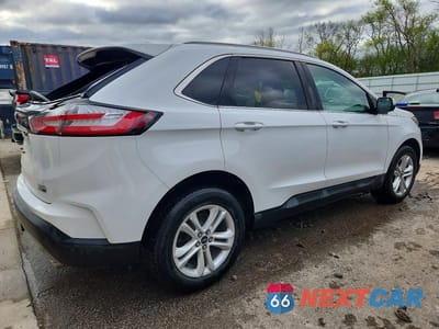 Trzecie zdjęcie samochodu z tyłu: 2019 FORD EDGE SEL VIN:2FMPK4J91KBC00279 - miniatura