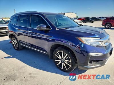 Czwarte zdjęcie samochodu z boku: 2020 HONDA PILOT TOURING VIN:5FNYF5H6XLB012556 - miniatura