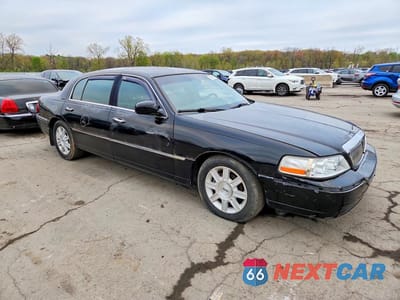 Czwarte zdjęcie samochodu z boku: 2011 LINCOLN TOWN CAR EXECUTIVE L VIN:2LNBL8EV2BX765469 - miniatura