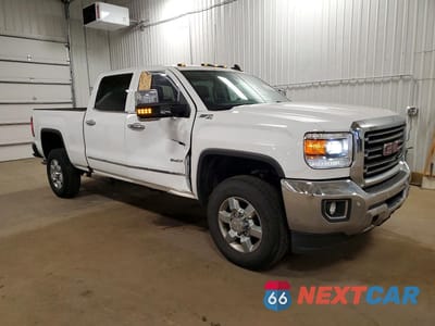 Czwarte zdjęcie samochodu z boku: 2017 GMC SIERRA K2500 SLT VIN:1GT12TEG6HF174458 - miniatura