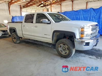 Czwarte zdjęcie samochodu z boku: 2015 CHEVROLET SILVERADO K2500 HEAVY DUTY LTZ VIN:1GC1KWEG4FF628494 - miniatura