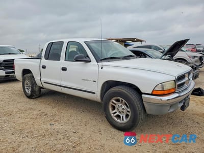 Czwarte zdjęcie samochodu z boku: 2001 DODGE DAKOTA QUAD VIN:1B7GL2AN21S107052 - miniatura