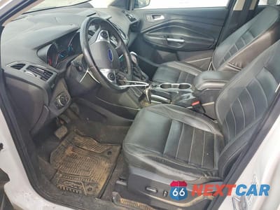 Zdjęcie 7 z 13 samochodu: 2014 FORD ESCAPE TITANIUM VIN:1FMCU9J91EUE34085 - miniatura