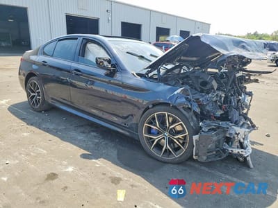 Czwarte zdjęcie samochodu z boku: 2022 BMW M550XI VIN:WBA13BK09NCH59451 - miniatura