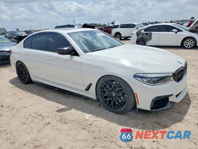 Czwarte zdjęcie samochodu z boku: 2020 BMW M550XI VIN:WBAJS7C05LCD82435 - miniatura