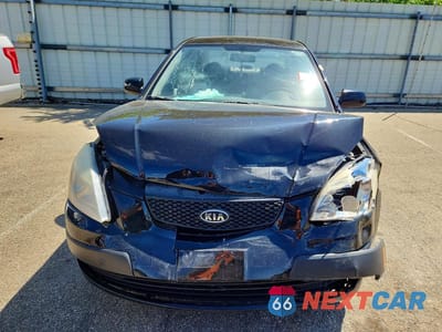 Piąte zdjęcie samochodu w środku: 2009 KIA RIO BASE VIN:KNADE223396469743 - miniatura