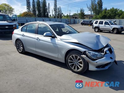 Czwarte zdjęcie samochodu z boku: 2018 BMW 320 I VIN:WBA8E1G59JNU92475 - miniatura