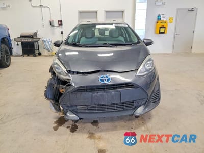 Piąte zdjęcie samochodu w środku: 2018 TOYOTA PRIUS C 5DR VIN:JTDKDTB33J1617880 - miniatura