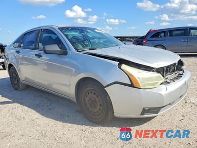Czwarte zdjęcie samochodu z boku: 2009 FORD FOCUS S VIN:1FAHP34N19W102719 - miniatura