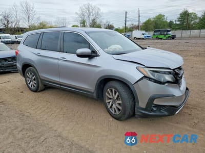 Czwarte zdjęcie samochodu z boku: 2020 HONDA PILOT EXL VIN:5FNYF5H5XLB005694 - miniatura