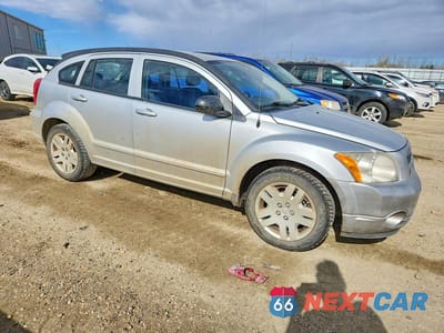 Czwarte zdjęcie samochodu z boku: 2010 DODGE CALIBER SXT VIN:1B3CB4HA2AD527965 - miniatura