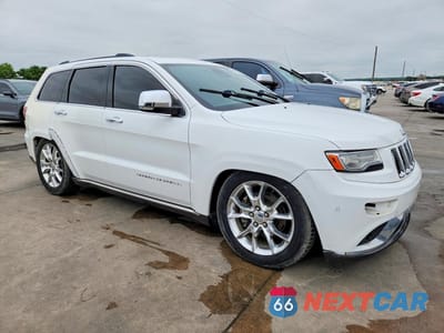 Czwarte zdjęcie samochodu z boku: 2014 JEEP GRAND CHEROKEE SUMMIT VIN:1C4RJFJM3EC426232 - miniatura