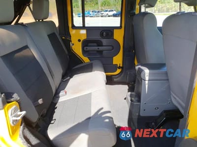 Zdjęcie 11 z 13 samochodu: 2009 JEEP WRANGLER UNLIMITED X VIN:1J4GA39169L700197 - miniatura