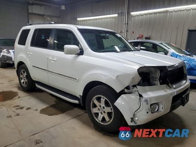 Czwarte zdjęcie samochodu z boku: 2009 HONDA PILOT TOURING VIN:5FNYF48879B056017 - miniatura
