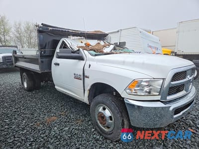 Czwarte zdjęcie samochodu z boku: 2018 RAM 3500 DUMP TRUCK VIN:3C7WRTBJ5JG114308 - miniatura