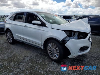 Czwarte zdjęcie samochodu z boku: 2022 FORD EDGE TITANIUM VIN:2FMPK4K91NBB01884 - miniatura