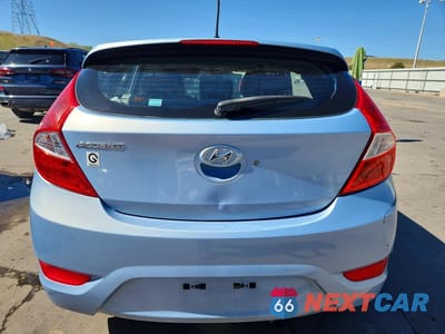 Zdjęcie 6 z 12 samochodu: 2014 HYUNDAI ACCENT SE VIN:KMHCU5AE6EU160095 - miniatura