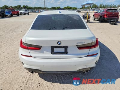 Zdjęcie 6 z 13 samochodu: 2021 BMW 330I VIN:3MW5R1J02M8C18207 - miniatura