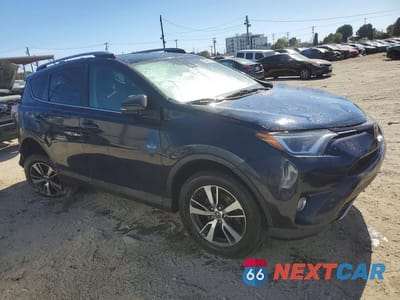 Czwarte zdjęcie samochodu z boku: 2017 TOYOTA RAV4 XLE VIN:JTMWFREVXHD105019 - miniatura