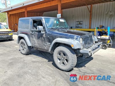 Czwarte zdjęcie samochodu z boku: 2015 JEEP WRANGLER SPORT VIN:1C4AJWAG9FL560736 - miniatura