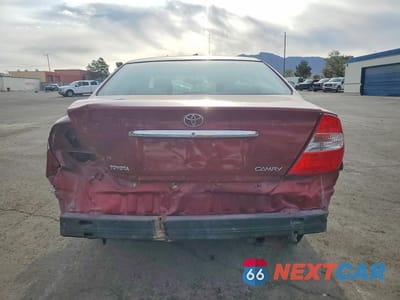 Zdjęcie 6 z 13 samochodu: 2002 TOYOTA CAMRY LE VIN:JTDBE32K720038421 - miniatura