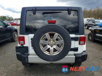 Zdjęcie 6 z 11 samochodu: 2017 JEEP WRANGLER UNLIMITED SAHARA VIN:1C4BJWEG3HL582040 - miniatura