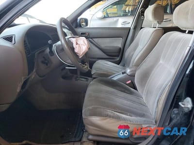 Zdjęcie 7 z 12 samochodu: 1996 TOYOTA CAMRY DX VIN:JT2BG12K5T0393869 - miniatura