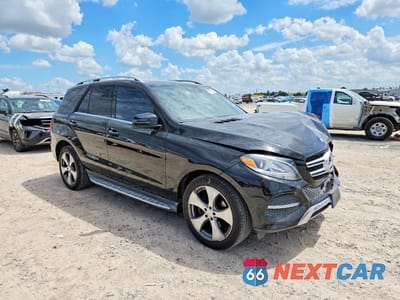 Czwarte zdjęcie samochodu z boku: 2016 MERCEDES-BENZ GLE 350 VIN:4JGDA5JB6GA811507 - miniatura