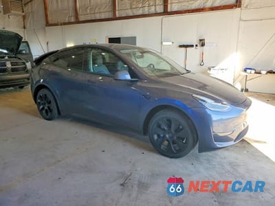 Czwarte zdjęcie samochodu z boku: 2023 TESLA MODEL Y VIN:7SAYGDEE1PA056096 - miniatura