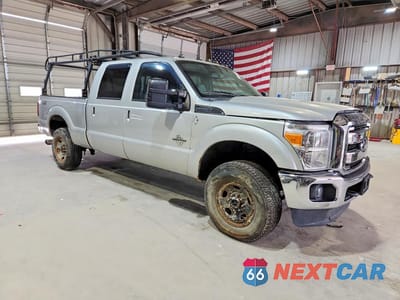 Czwarte zdjęcie samochodu z boku: 2014 FORD F250 SUPER DUTY VIN:1FT7W2BT8EEB84002 - miniatura