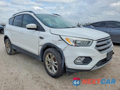 Czwarte zdjęcie samochodu z boku: 2017 FORD ESCAPE SE VIN:1FMCU0GD0HUA60869 - miniatura