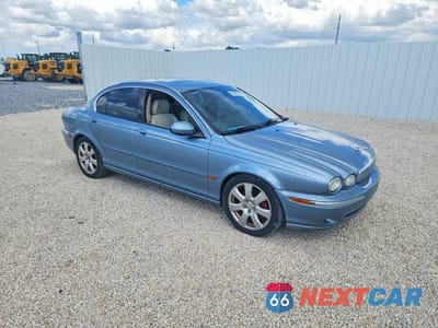 Czwarte zdjęcie samochodu z boku: 2004 JAGUAR X-TYPE 3.0 VIN:SAJEA51C34WD74392 - miniatura