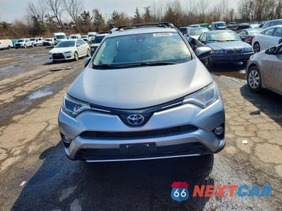 Piąte zdjęcie samochodu w środku: 2018 TOYOTA RAV4 HYBRID XLE VIN:JTMRJREVXJD236419 - miniatura