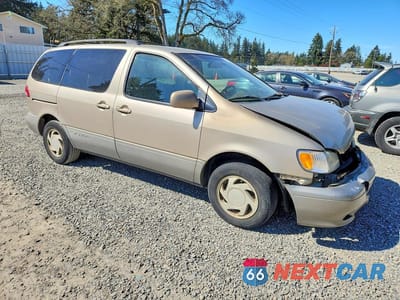 Czwarte zdjęcie samochodu z boku: 2002 TOYOTA SIENNA LE VIN:4T3ZF13C12U484390 - miniatura