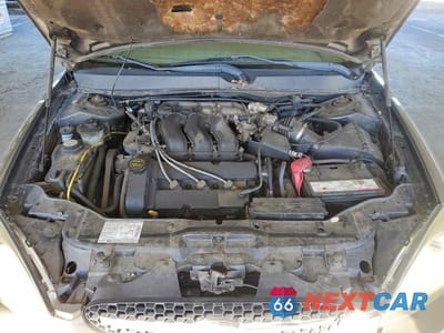 Zdjęcie 11 z 11 samochodu: 2003 FORD TAURUS SEL VIN:1FAHP56S23G149287 - miniatura