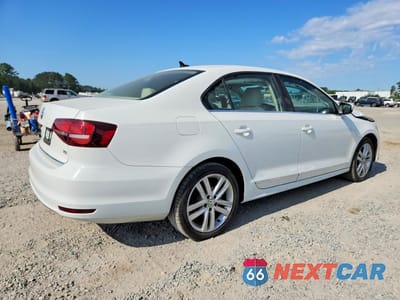 Trzecie zdjęcie samochodu z tyłu: 2017 VOLKSWAGEN JETTA SEL VIN:3VWL17AJ7HM222986 - miniatura