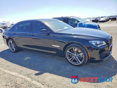 Czwarte zdjęcie samochodu z boku: 2015 BMW 750 LI VIN:WBAYE8C56FD780840 - miniatura