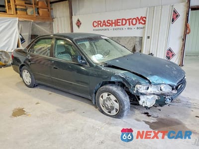 Czwarte zdjęcie samochodu z boku: 2000 HONDA ACCORD LX VIN:1HGCG1647YA045520 - miniatura