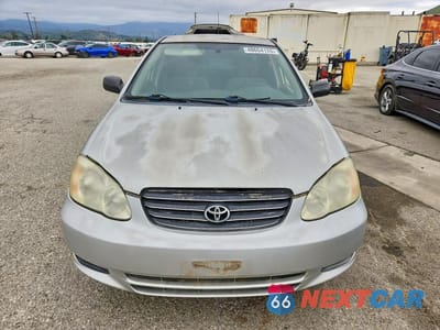 Piąte zdjęcie samochodu w środku: 2003 TOYOTA COROLLA CE VIN:JTDBR32E730043246 - miniatura