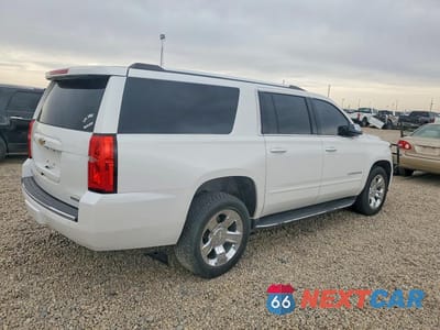 Trzecie zdjęcie samochodu z tyłu: 2020 CHEVROLET SUBURBAN K1500 PREMIER VIN:1GNSKJKC0LR174092 - miniatura