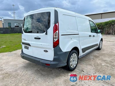 Czwarte zdjęcie samochodu z boku: 2014 FORD TRANSIT CONNECT XL VIN:NM0LS7E7XE1136351 - miniatura