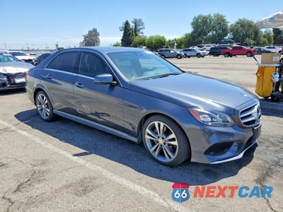 Czwarte zdjęcie samochodu z boku: 2016 MERCEDES-BENZ E 350 VIN:WDDHF5KB4GB213082 - miniatura