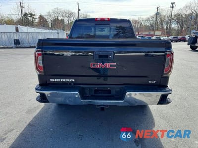 Piąte zdjęcie samochodu w środku: 2018 GMC SIERRA K1500 SLT VIN:3GTU2NEC0JG561355 - miniatura