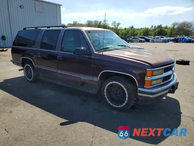 Czwarte zdjęcie samochodu z boku: 1996 CHEVROLET SUBURBAN C1500 VIN:1GNEC16R7TJ348781 - miniatura